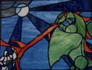 Art glass picture of knight fighting a green dragon