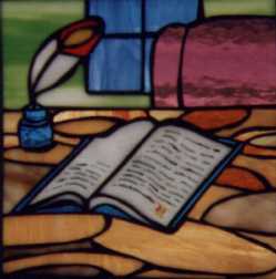 Stained glass rendition of an office with window, wooden desk and chair